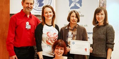 Celebrating Success: Karen Bowman, Director of Procurement, with the award alongside representatives from the Department of Social Responsibility and Sustainability and EUSA.