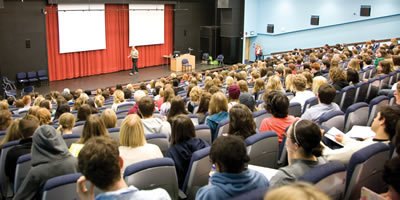 Lecture theatre full of students Lecture theatre full of students