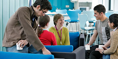 Photo of staff taking a break in a common area