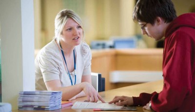 Advisor speaking to student