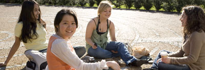Students sitting on the ground Students sitting on the ground