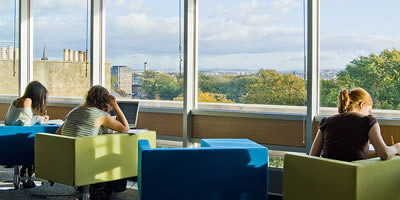 Students using one of the study areas in the main library