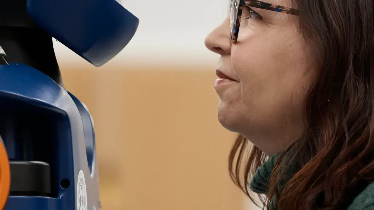 Prof Shannon Vallor nose-to-nose with robot