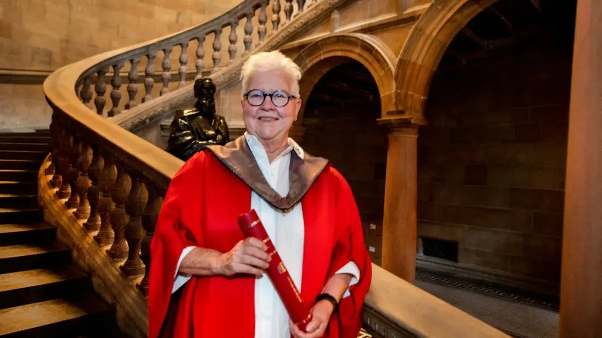 Val McDermid holds her honorary degree following the ceremony at the McEwan Hall