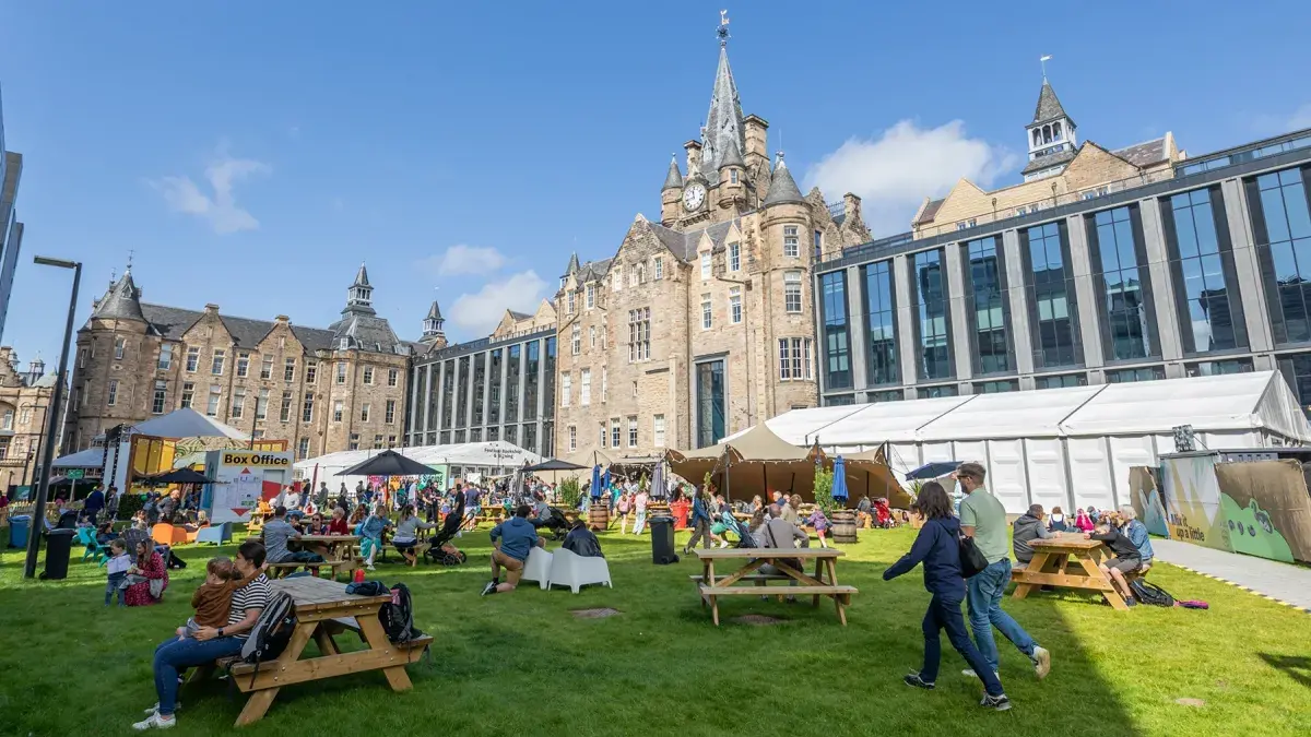 Festival goers enjoy the International Book Festival site at the Edinburgh Futures Institute. 