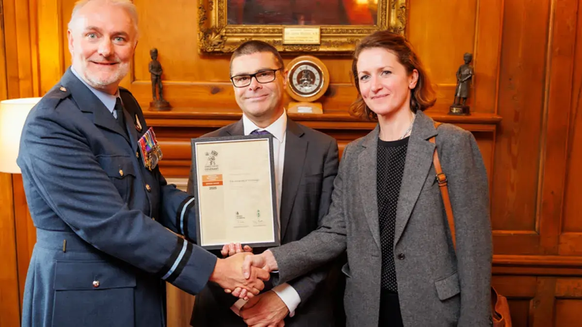 James Saville, Director of Human Resource (centre) and Sally Morgan, Technician Steering Committee Chair (right), accept the bronze award from the Ministry of Defence’s Employer Recognition Scheme. The award was presented by the Lowland Reserve Forces and Cadets Association. 