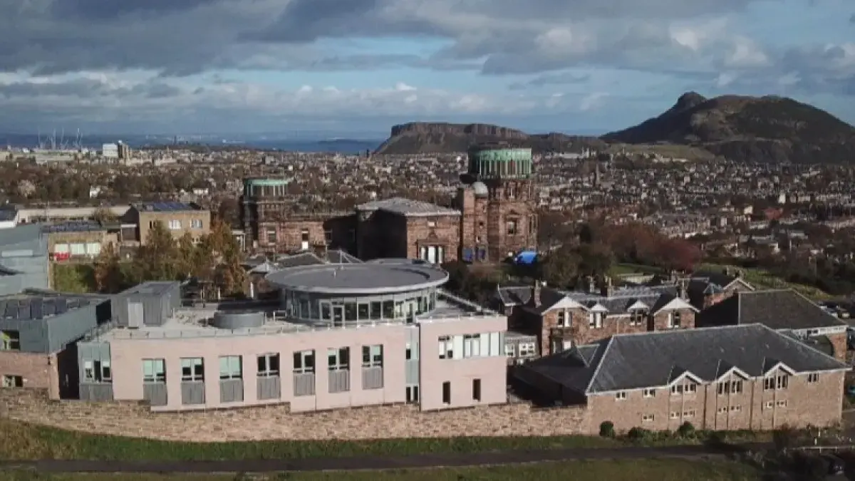 An aerial view of the Royal Observatory Edinburgh and the city behind