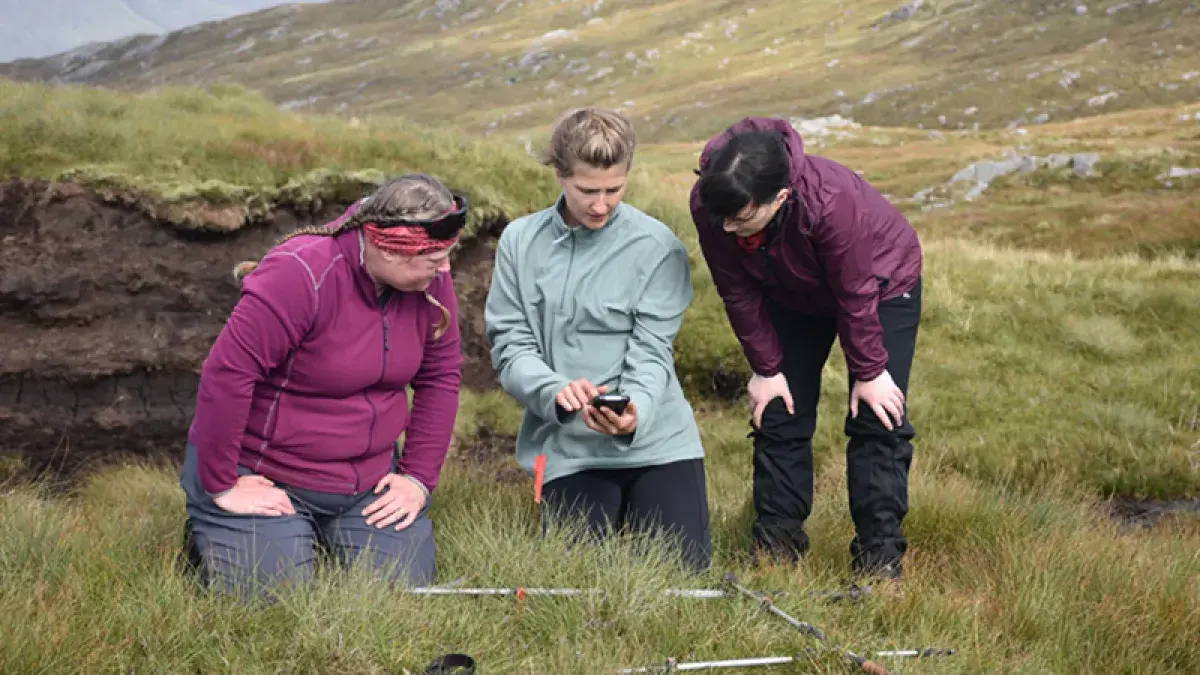 Eleanor Birch, Tilda Tarrant and Dr Nicholle Bell input monitoring data at Ardtornish Estate in Morven