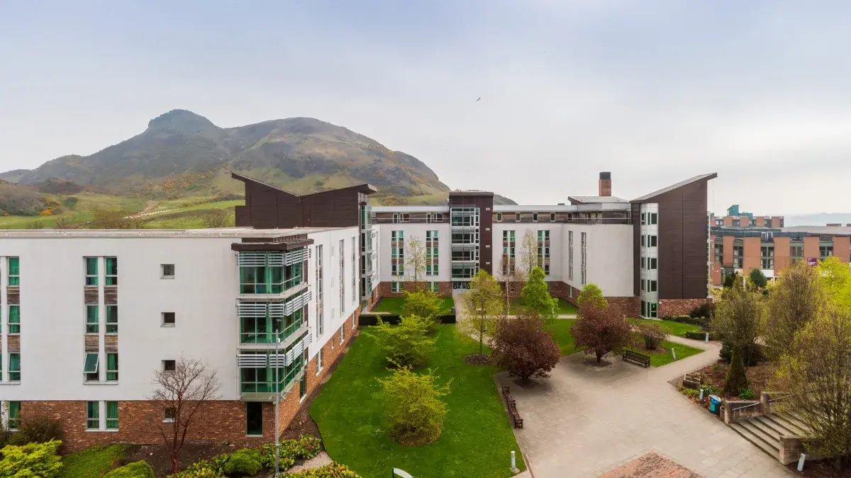 An aerial view of Pollock Halls with Arthur's Seat in the background