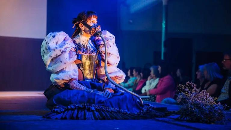 A model wears an elaborate design by ECA Performance Costume students at their graduate showcase