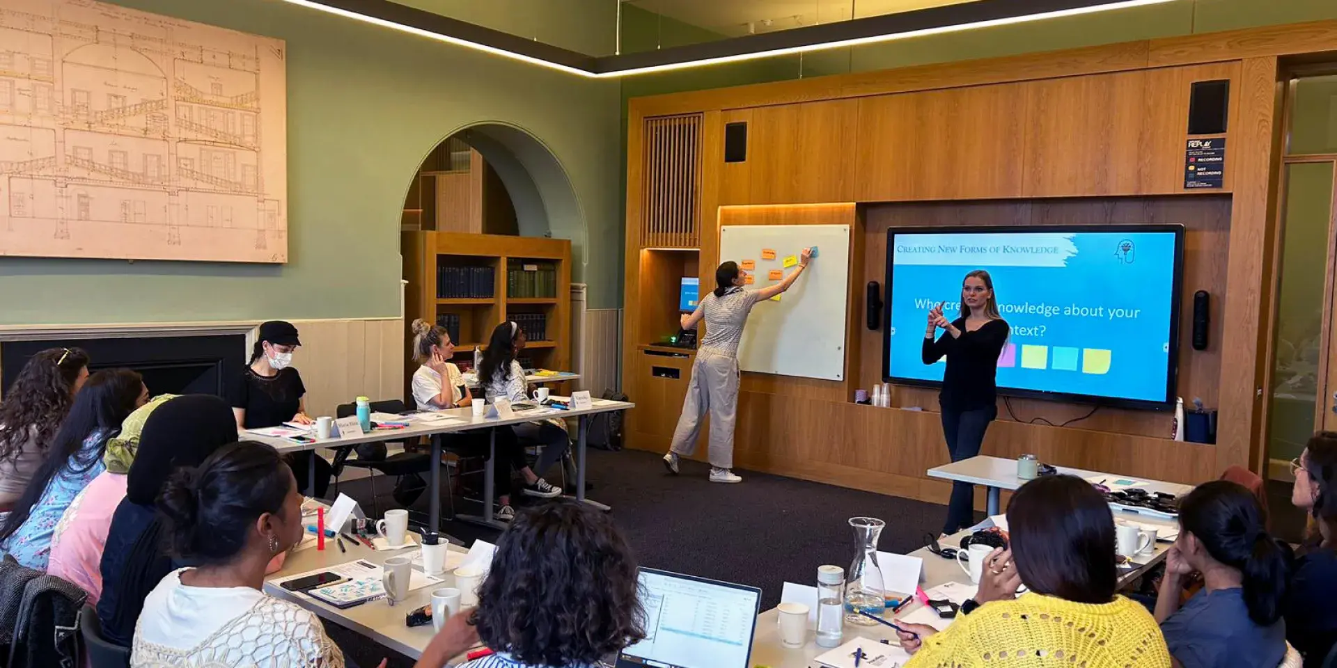 A group of people at a conference