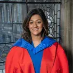 Naeema Yaqoob Sajid receiving their honorary grad.