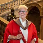 Valerie Lesley Campbell McDermid receiving their honorary degree.