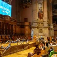 Colleagues looking towards the stage in McEwan Hall
