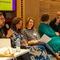 Colleagues during a session at The Impact Fesitval