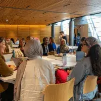 Colleagues during a session at The Impact Fesitval