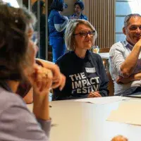 Colleagues during a session at The Impact Fesitval