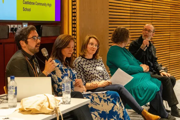 Colleagues during a session at The Impact Fesitval