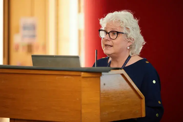 Tina Harrison speaking at the PGT dissertation celebration event