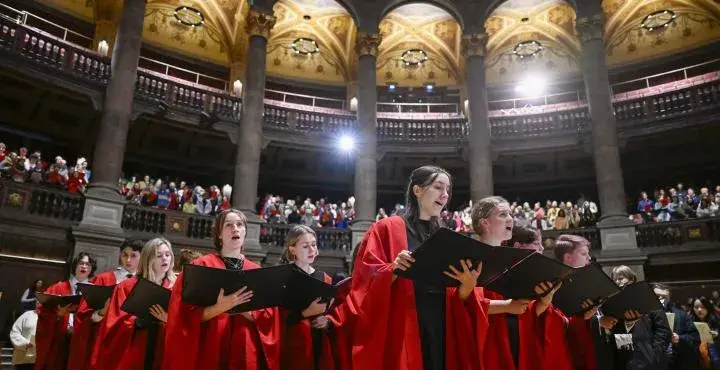 University of Edinburgh choir sing at a carol service in McEwan Hall, Edinburgh