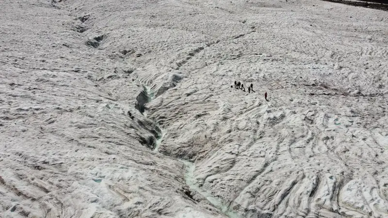 An exhibition of scientists from the European Space Agency examining the Gorner Glacier in Switzerland