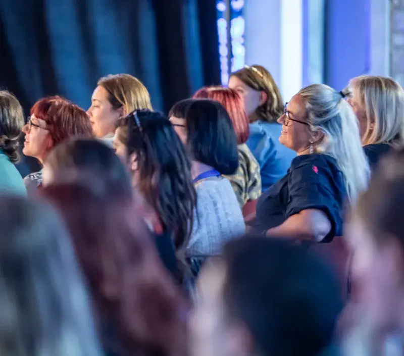Audience members watch an event at Edinburgh International Book Festival, held at Edinburgh Futures Institute in 2024